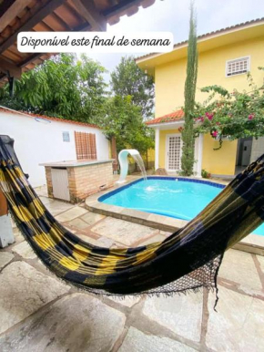 Puro Luxo Menor Preço dw Pirenópolis Na cidade Com Piscina Aquecida e Cascata Ar Condicuonado Área Gourmet Área de Lazer Pertinho de Todo E ganha passeio!